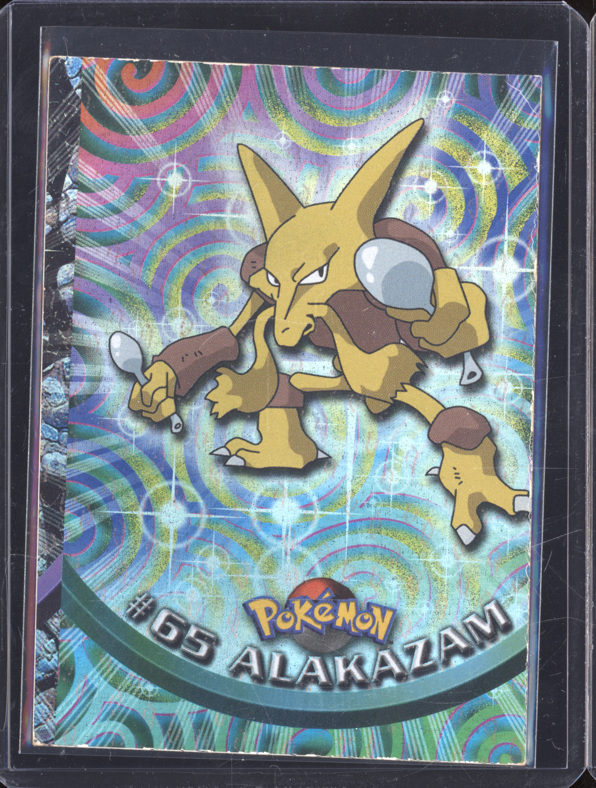1999 Topps Pokemon #65 Alakazam — front
