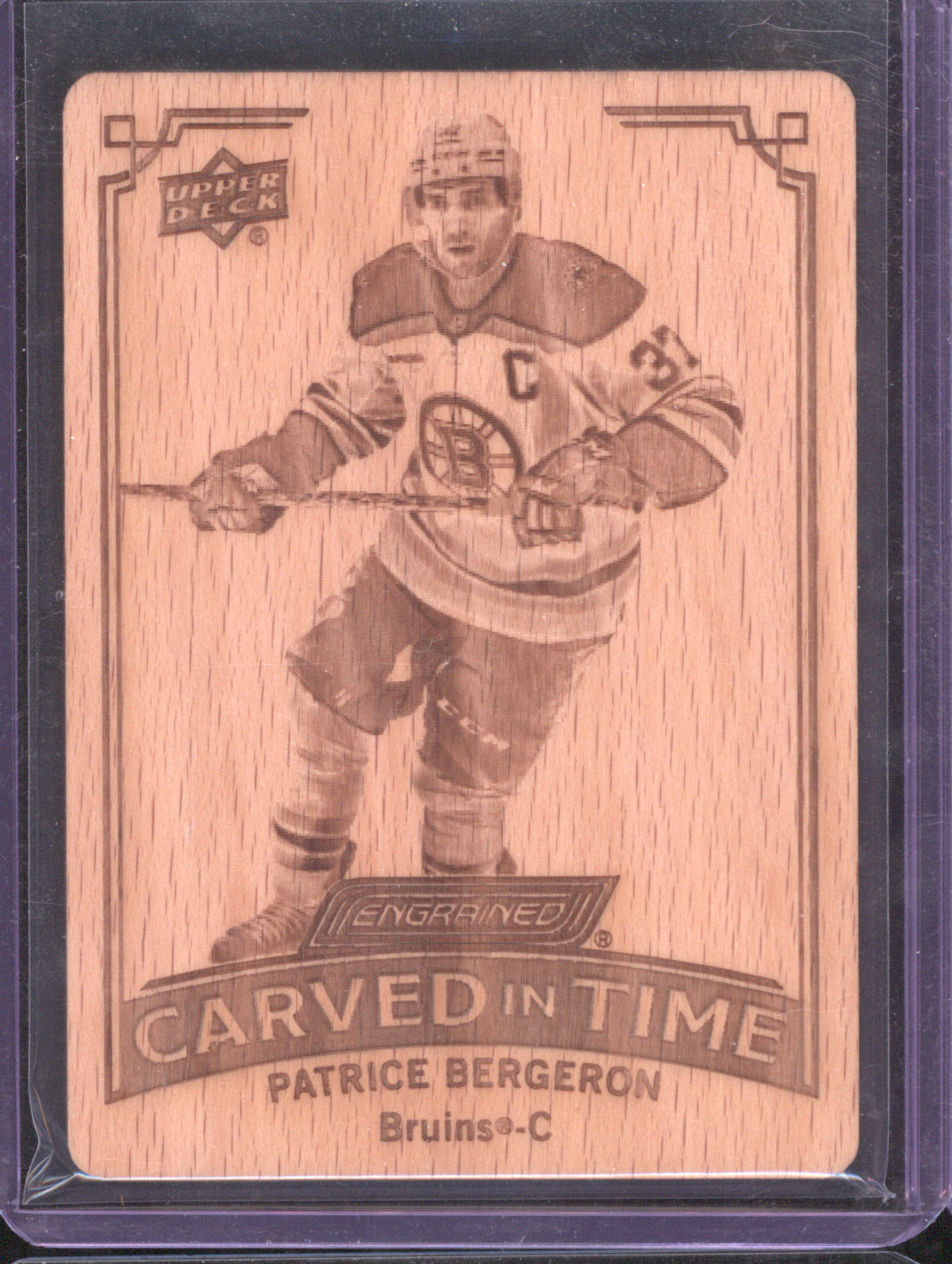 2023-24 Upper Deck Engrained Carved in Time #CT-27 Patrice Bergeron — front