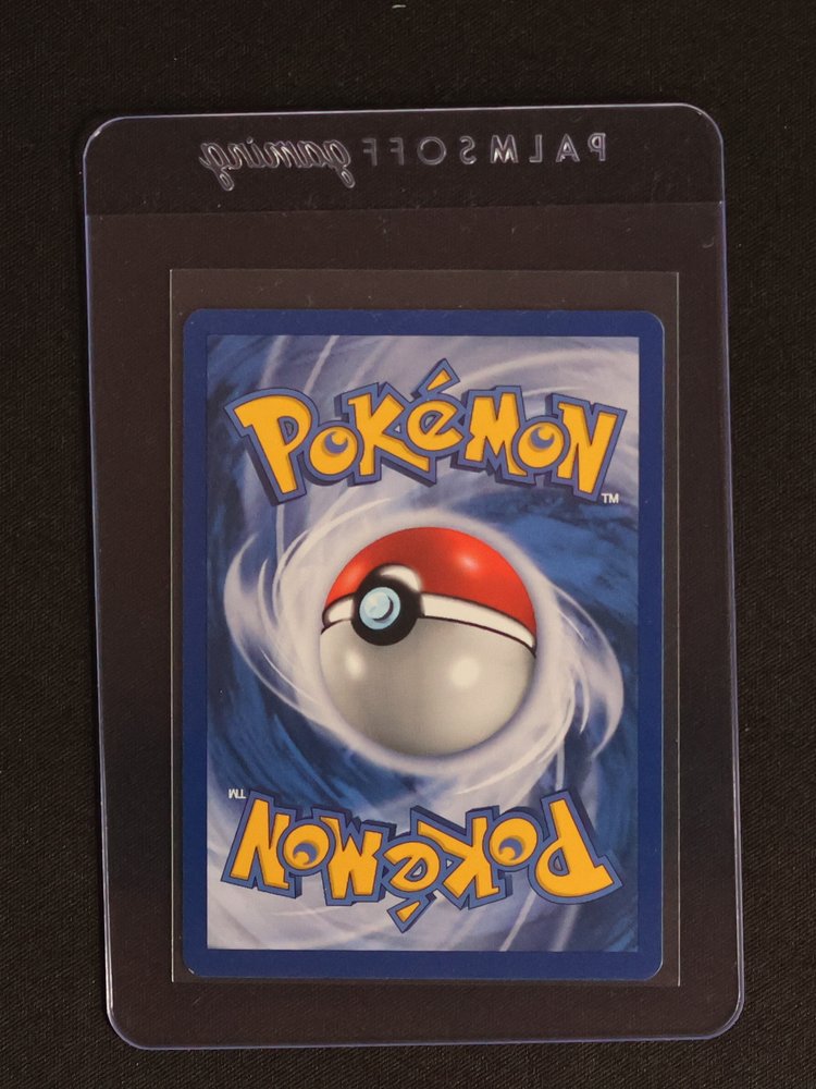 1999 Pokémon Team Rocket #45 Dark Vaporeon — front