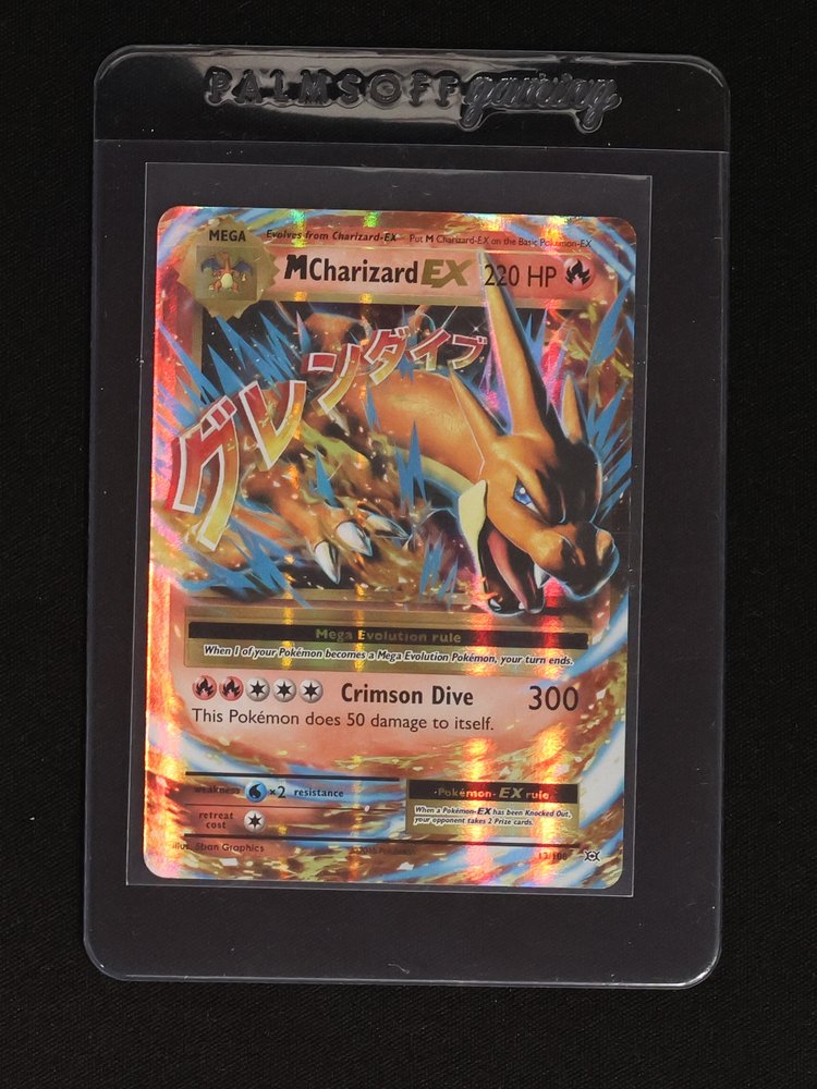 2016 Pokémon XY Evolutions #13 M Charizard EX — front