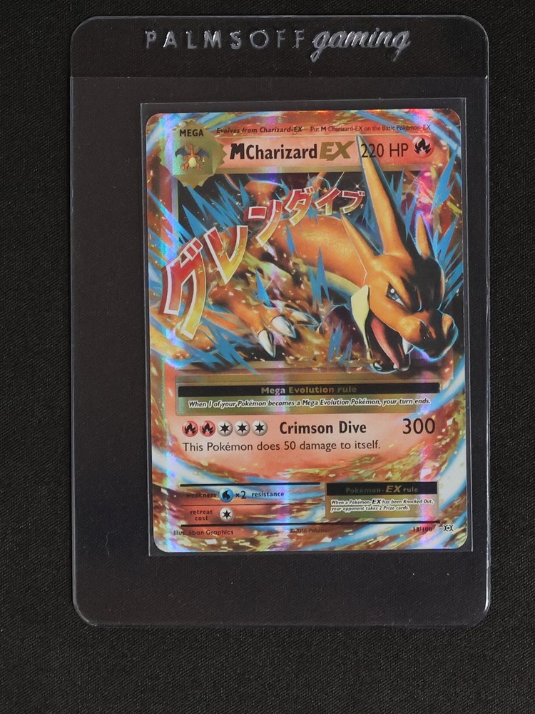 2016 Pokémon #13 M Charizard EX — front