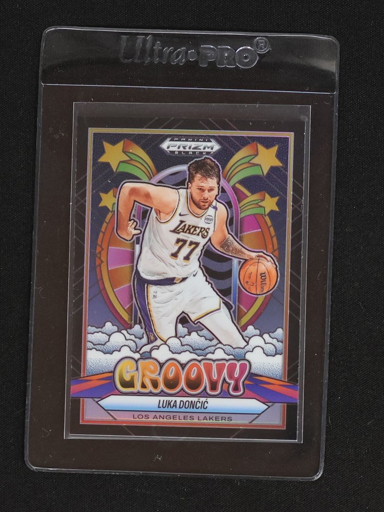 2024-25 Panini Prizm Black #14 Luka Dončić Groovy — front