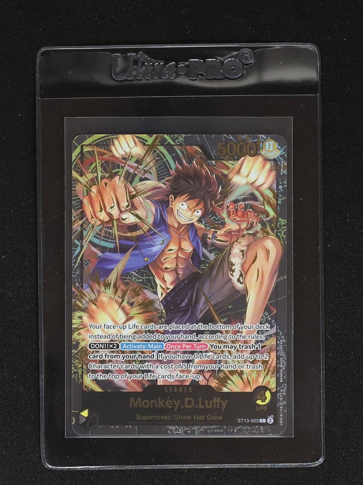 One Piece Card Game ST13-003 Monkey D. Luffy Leader — front