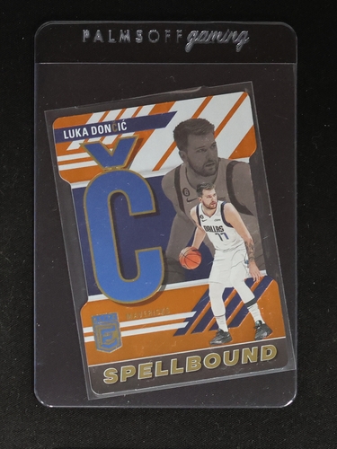 2023-24 Donruss Elite #28 Luka Dončić Spellbound Orange Die-Cut C — front