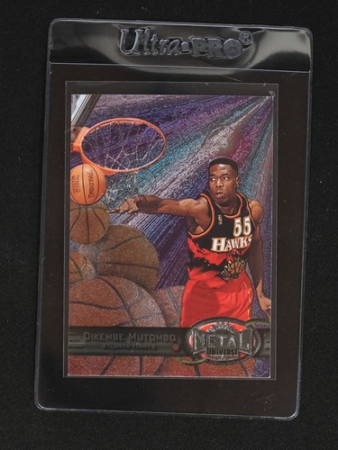 1997-98 Skybox Metal Universe #106 Dikembe Mutombo — front